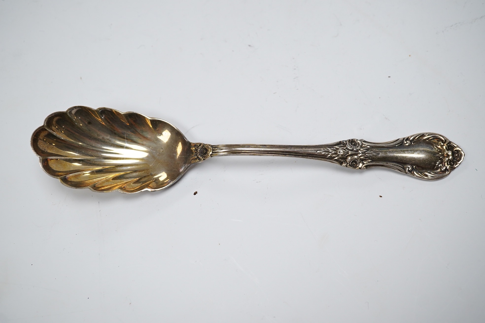 A cased part canteen of American sterling cutlery, weighable silver 63.8oz, together with four silver plated table forks. Condition - poor to fair